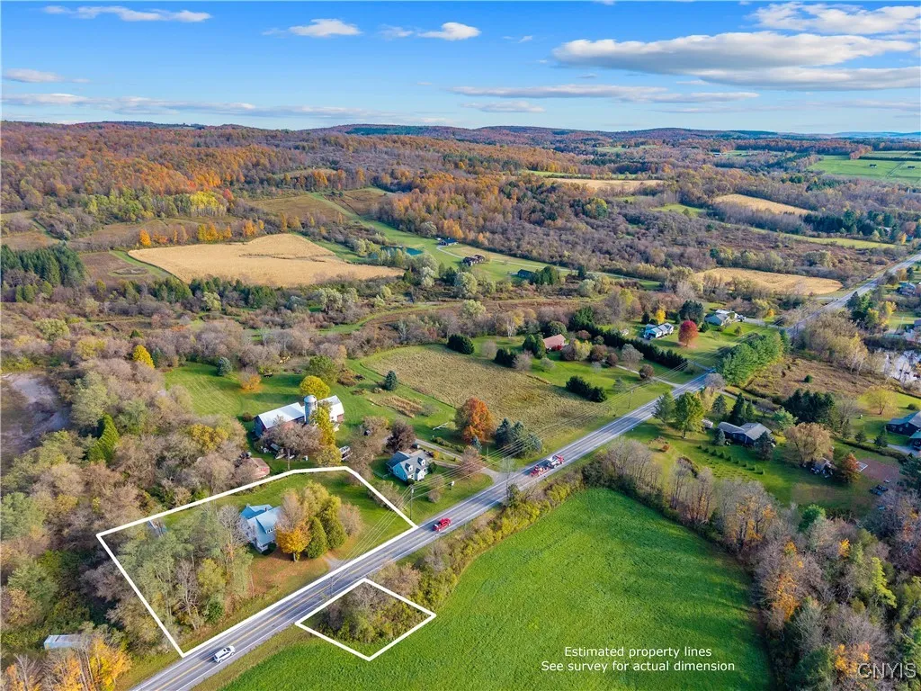 Aerial view showing lot with area across the street.  All one tax map numer.