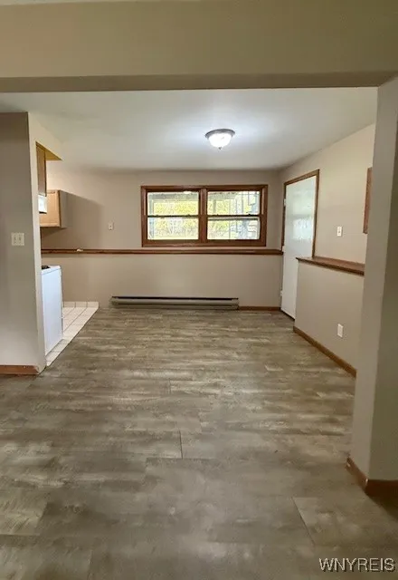 Lower unit open floor plan, view of dining area from the living room