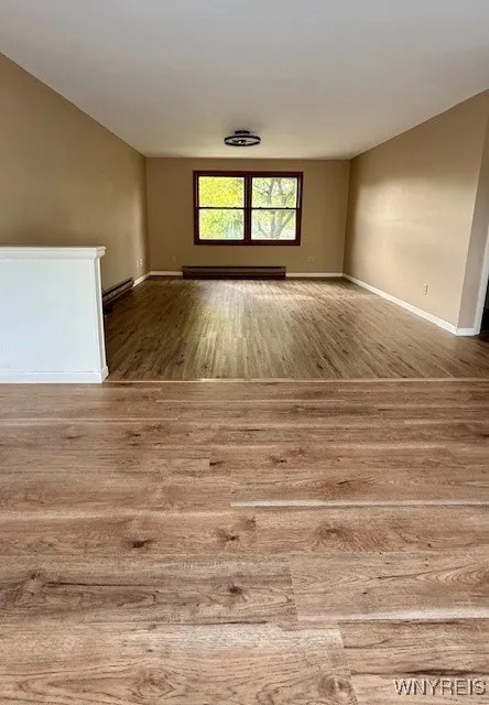 Upper open floor plan, looking into the
 living room from dining area