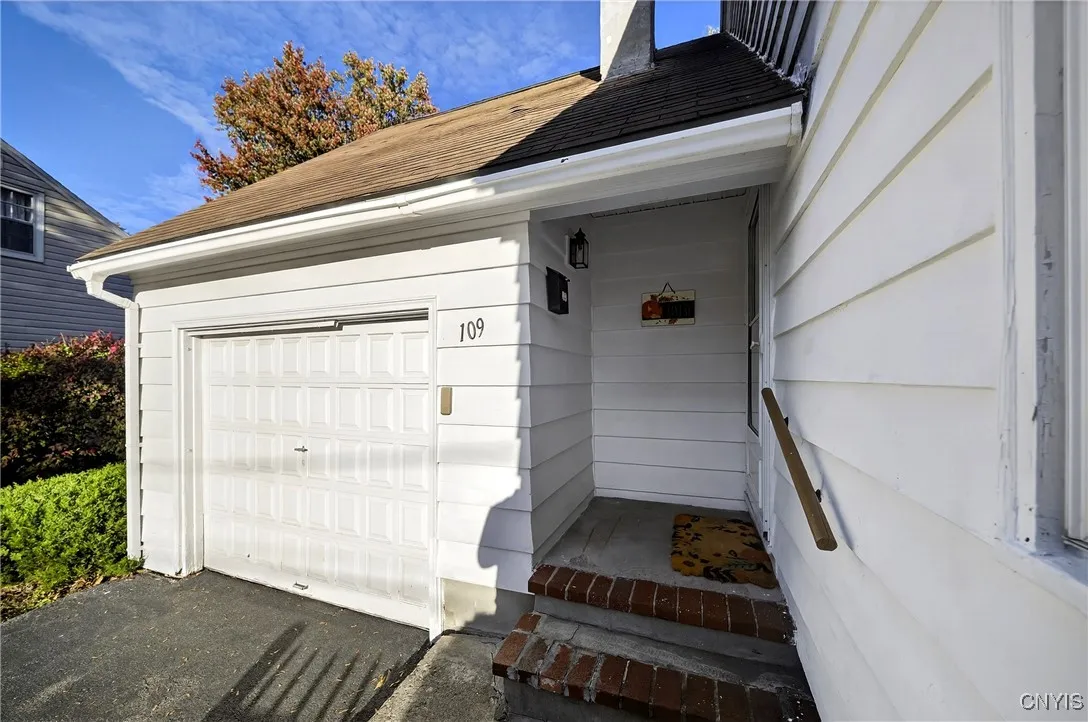 Attached garage and main entrance.