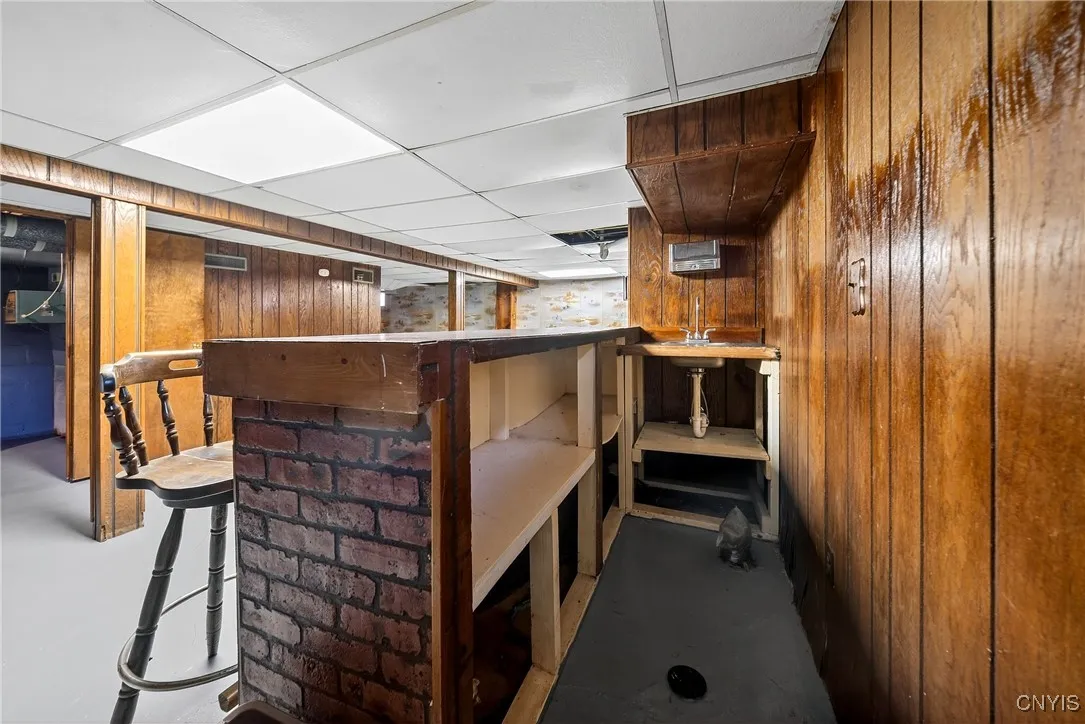 Wet bar for entertaining.  Also shows that it is plumbed in for a bathroom.