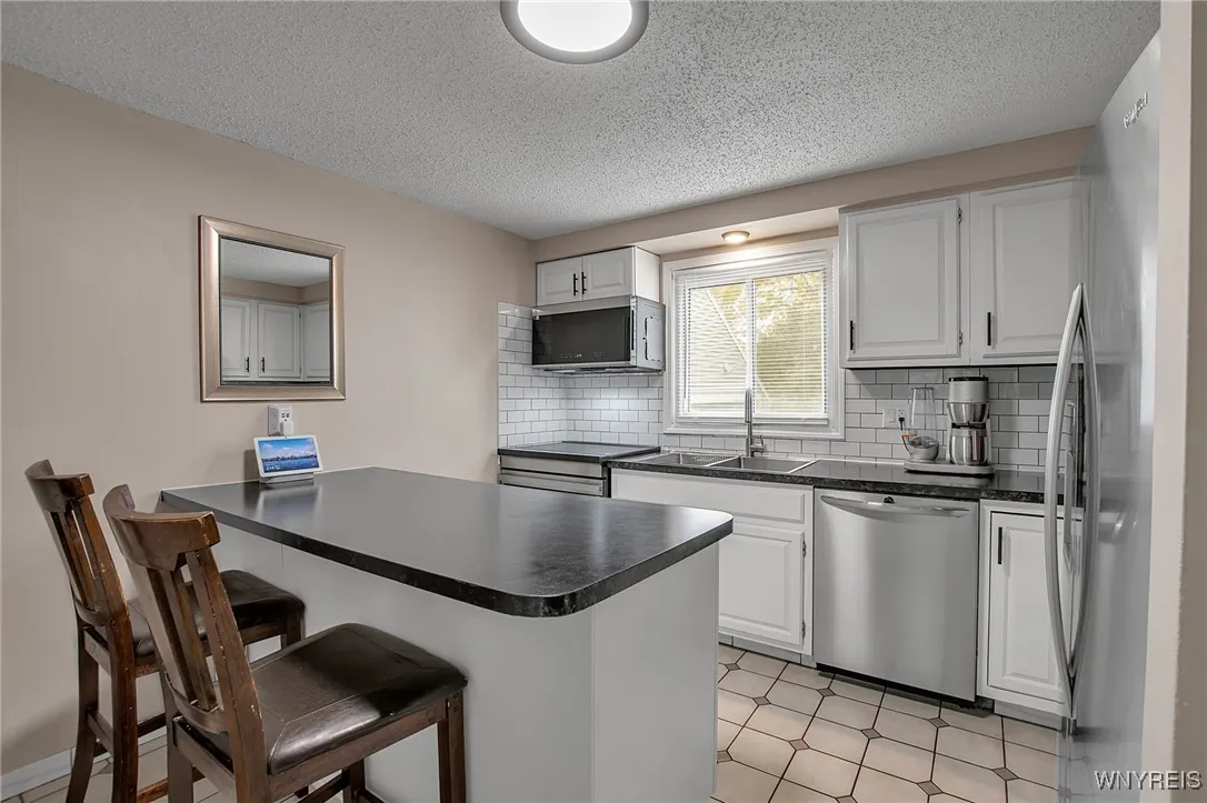 10 Woodmoor Circle, Amherst, New York 14051, Amherst, New York 14051, 3 Bedrooms Bedrooms, 8 Rooms Rooms,1 BathroomBathrooms,Residential,For Sale,10 Woodmoor Circle, Amherst, New York 14051,0,B1646278