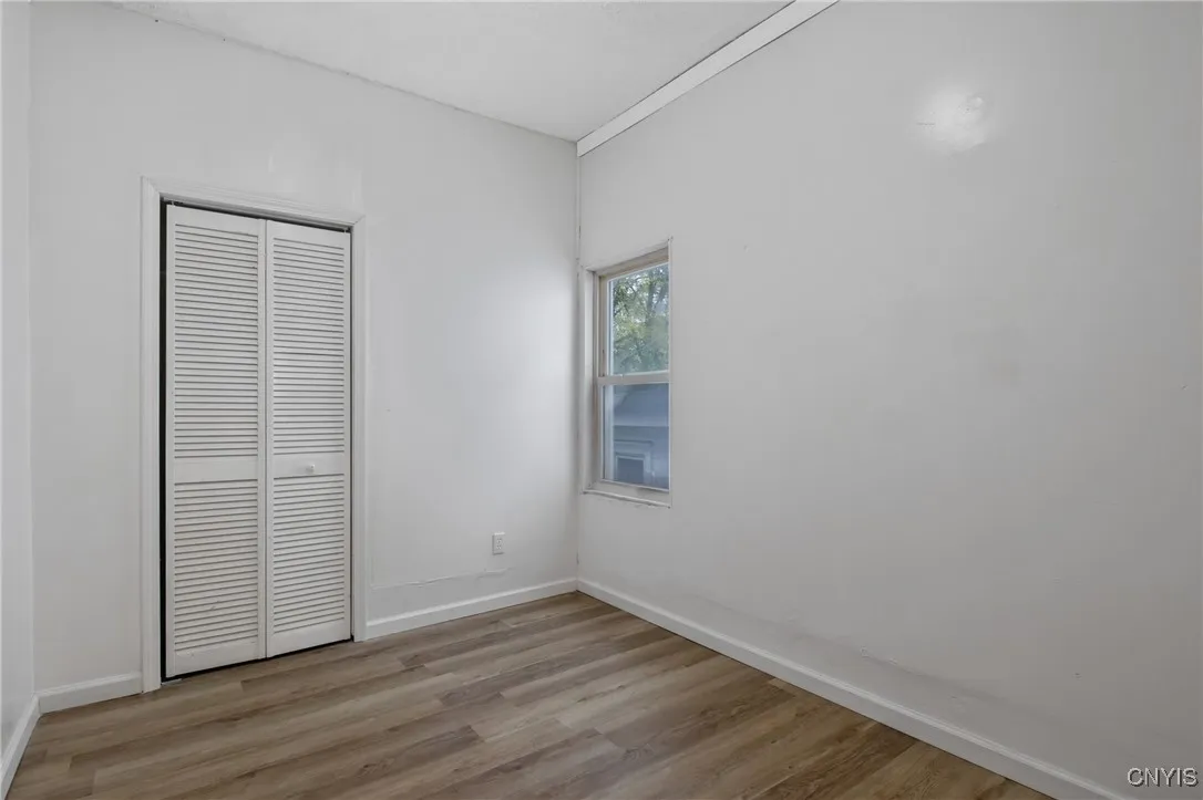 Bedroom number one, located off bonus space at front of home.