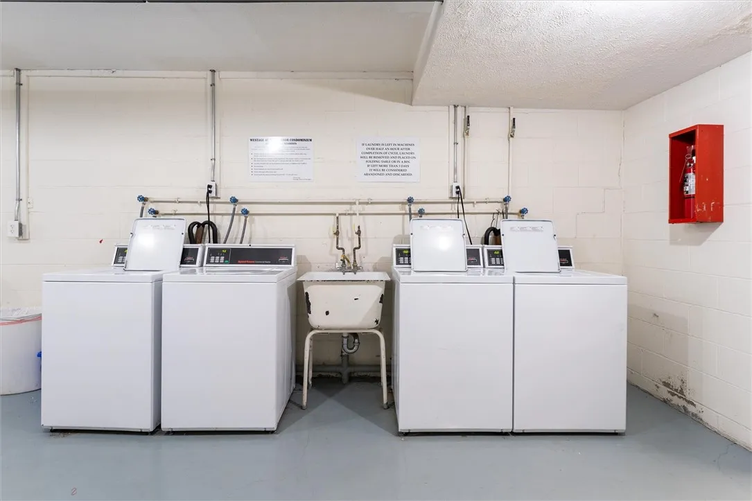 Laundry Area Down The Hall Past The Rear Entrance