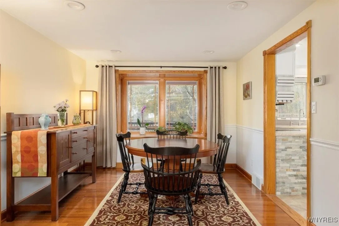 Formal dining room, hickory hardwoods and bay window - lets the light in!