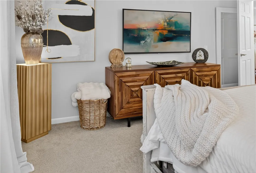 THAT'S A MOUNTED TV ABOVE THE DRESSER
