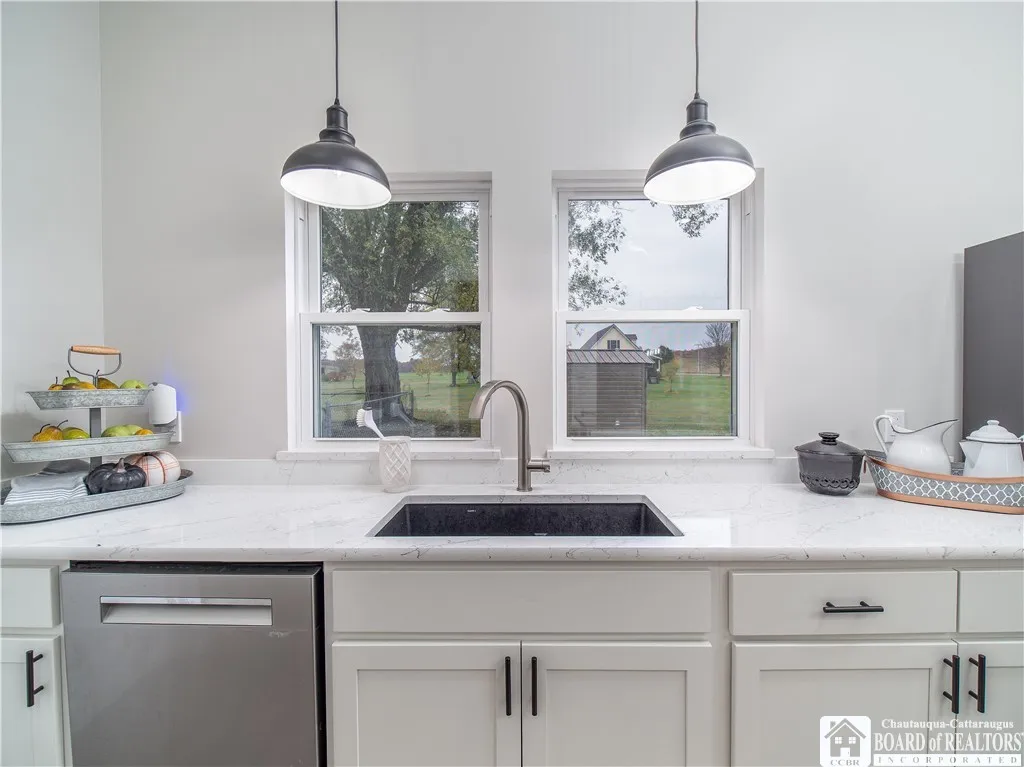 Views out to the neighboring fields and mature trees while working in the kitchen is a real delight!