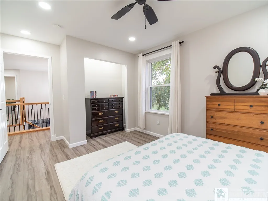 View out to the landing and custom staircase.