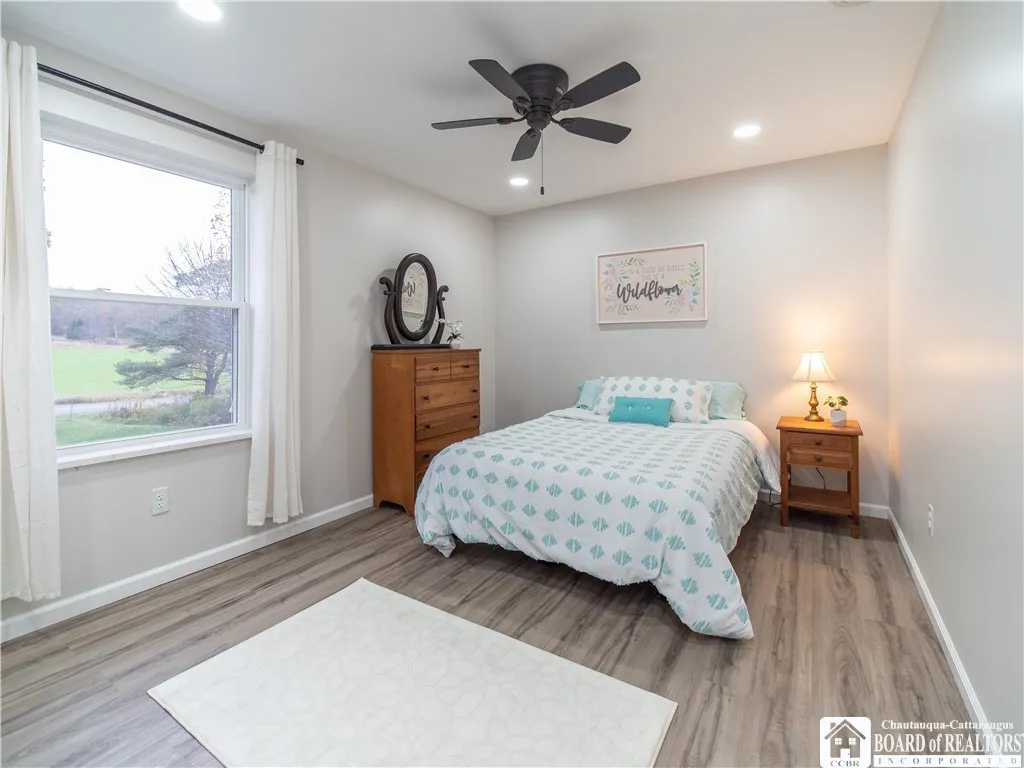 Bedroom faces the front yard and is bright and spacious, easily accommodating up to a king sized bed.