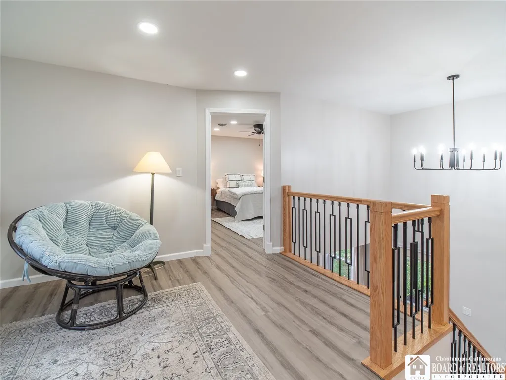 The landing on the second floor is the perfect place to hang out or cozy up with a good book.