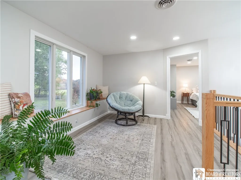 Enjoy sweeping vistas of the neighboring hillside out of this beautiful oversized window.