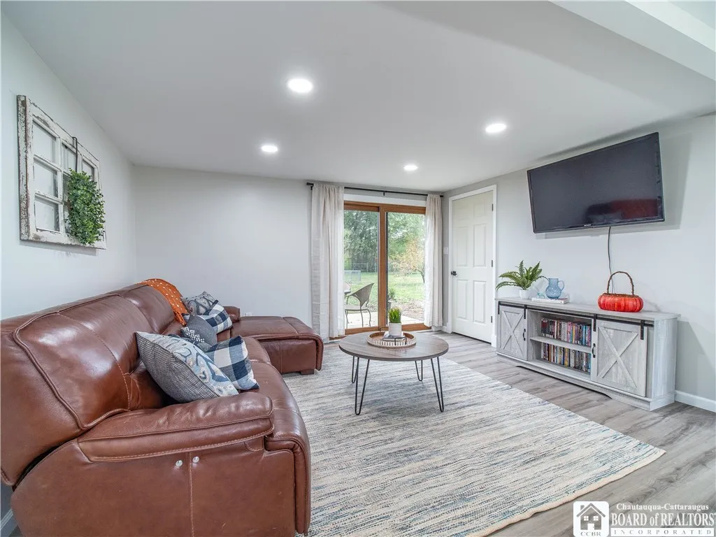 Entering back inside from the rear yard, you'll love the convenience of the basement stairway being a step away from the sliding glass door.