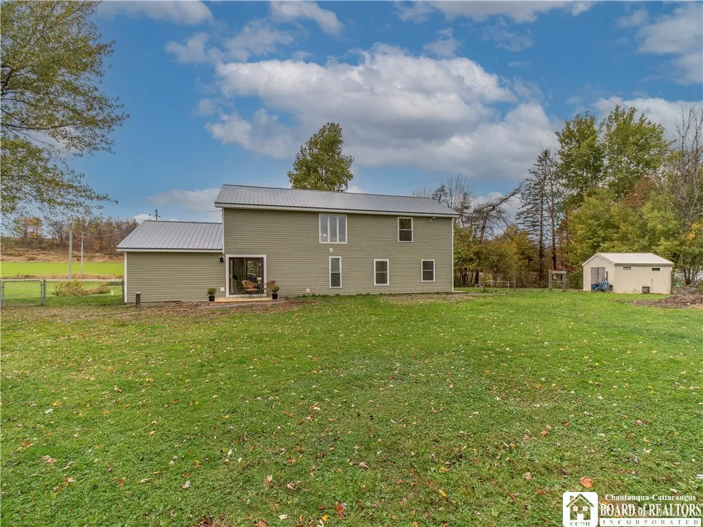 The rear of the home could be customized with a pool, hot tub, patio or more on this deep, level lot.