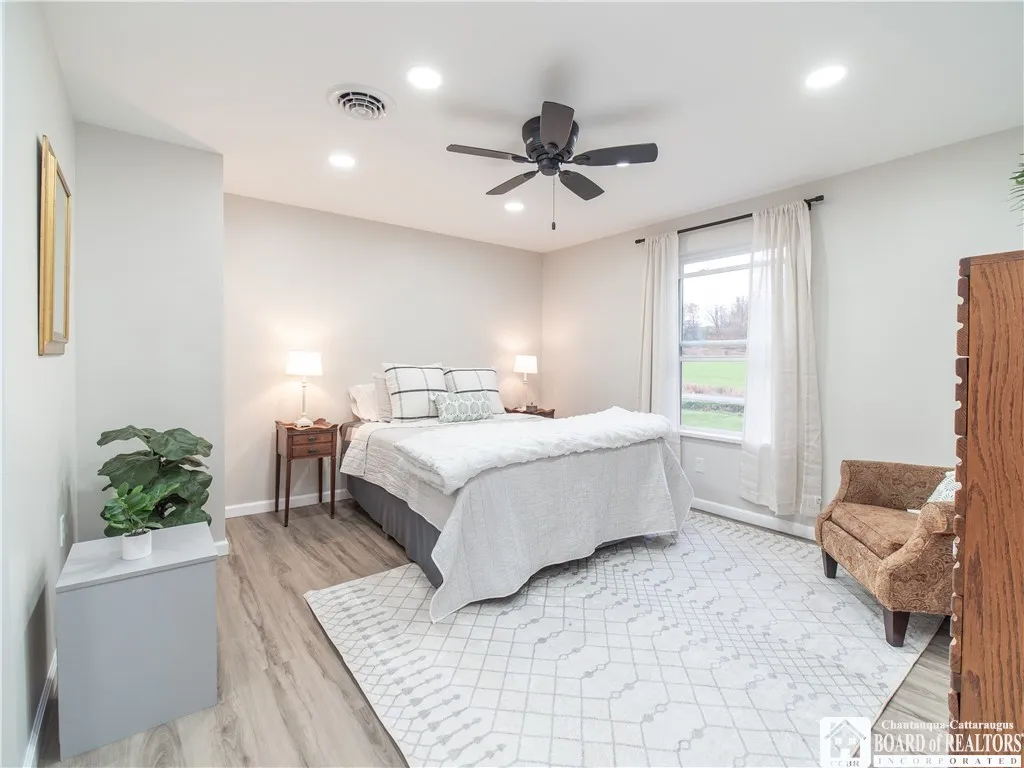 Spacious primary bedroom with large walk-in closet could be converted into an en-suite bath.