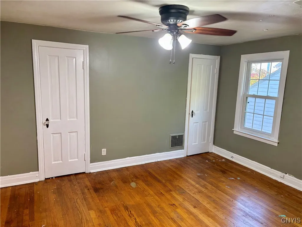 Large bedroom with two closets