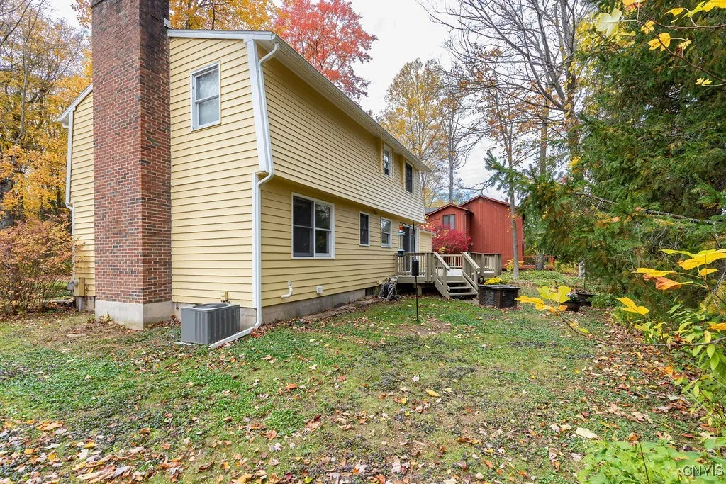 Notice the full masonry fireplace in the living room—perfect for cozy winter evenings. The newer central air compressor keeps the home comfortable during warmer summer months, making this home a perfect combination for all seasons.