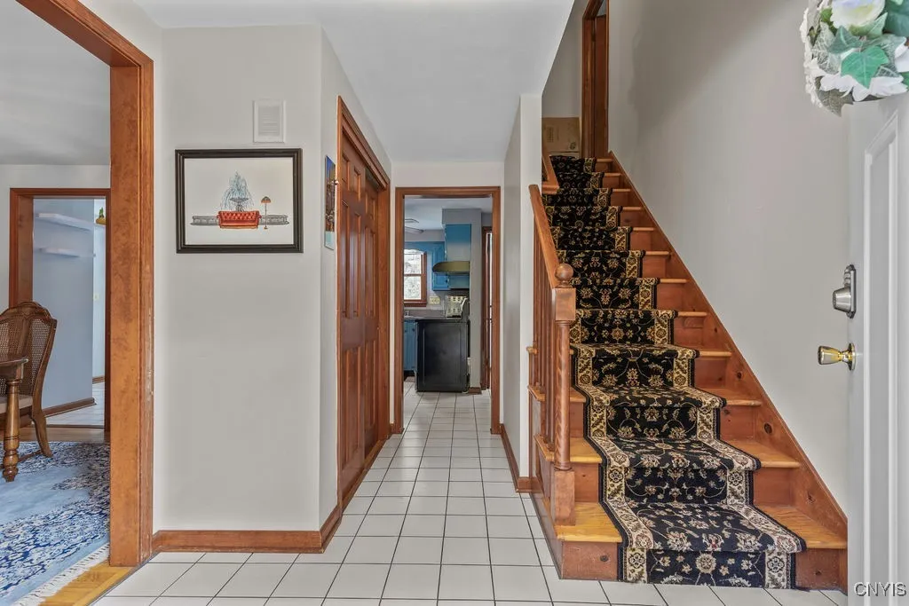 IThis home features many rooms throughout, all showcasing classic hardwood floors that are both durable and elegant, adding warmth and sophistication to every space.