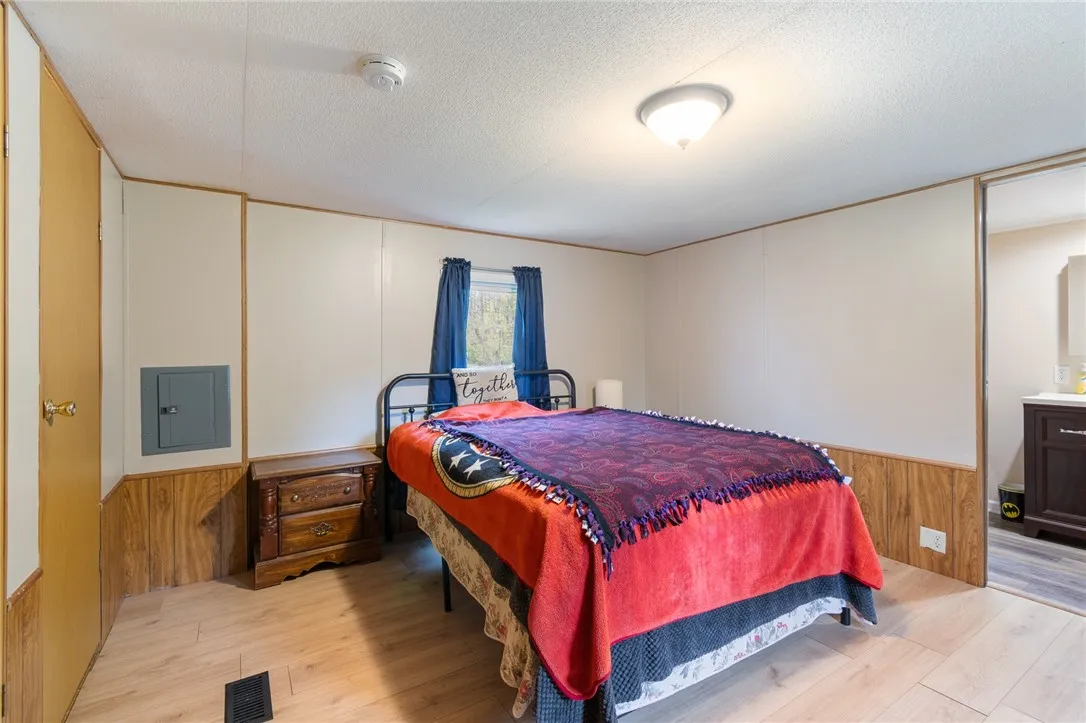 The primary bedroom with walk in closet AND full bath!
