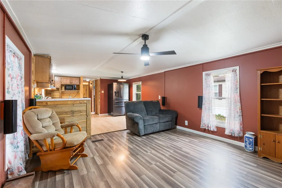 The living room to kitchen view - all new floors!