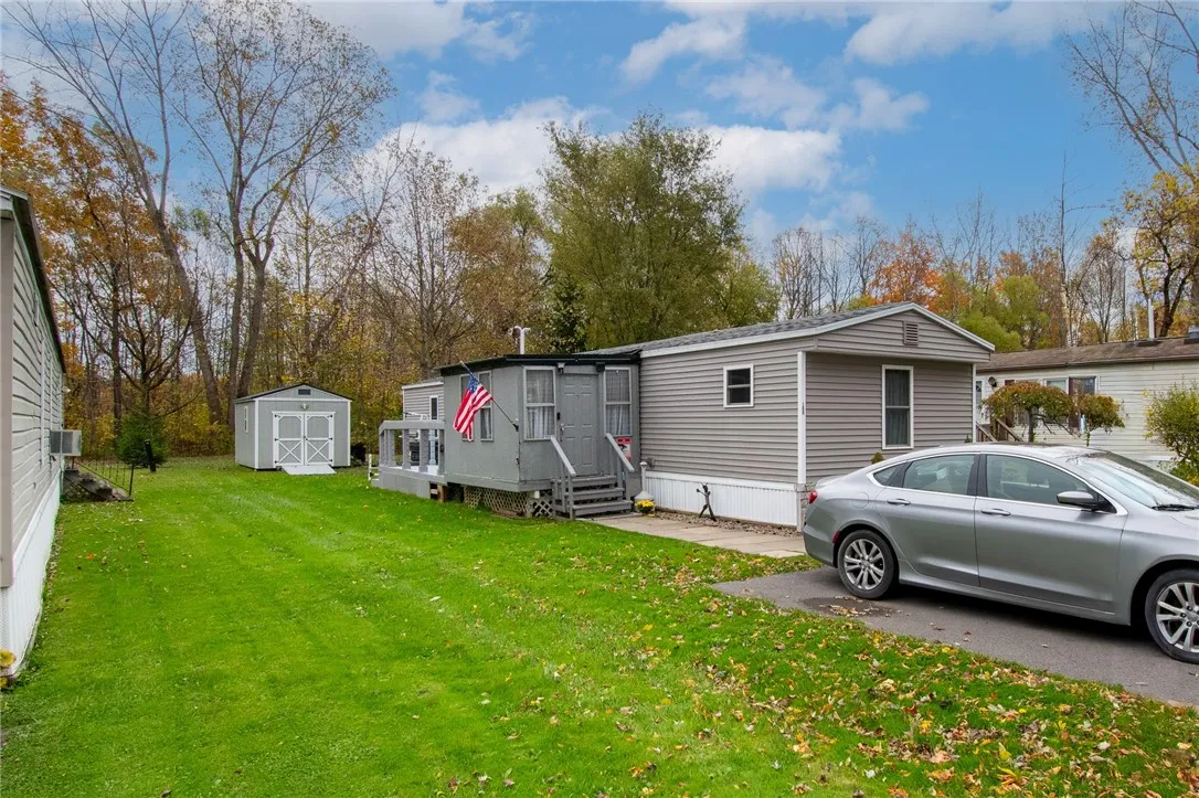 There’s a MUDROOM - a BACK DECK- even a shed! Ample parking for two cars too!