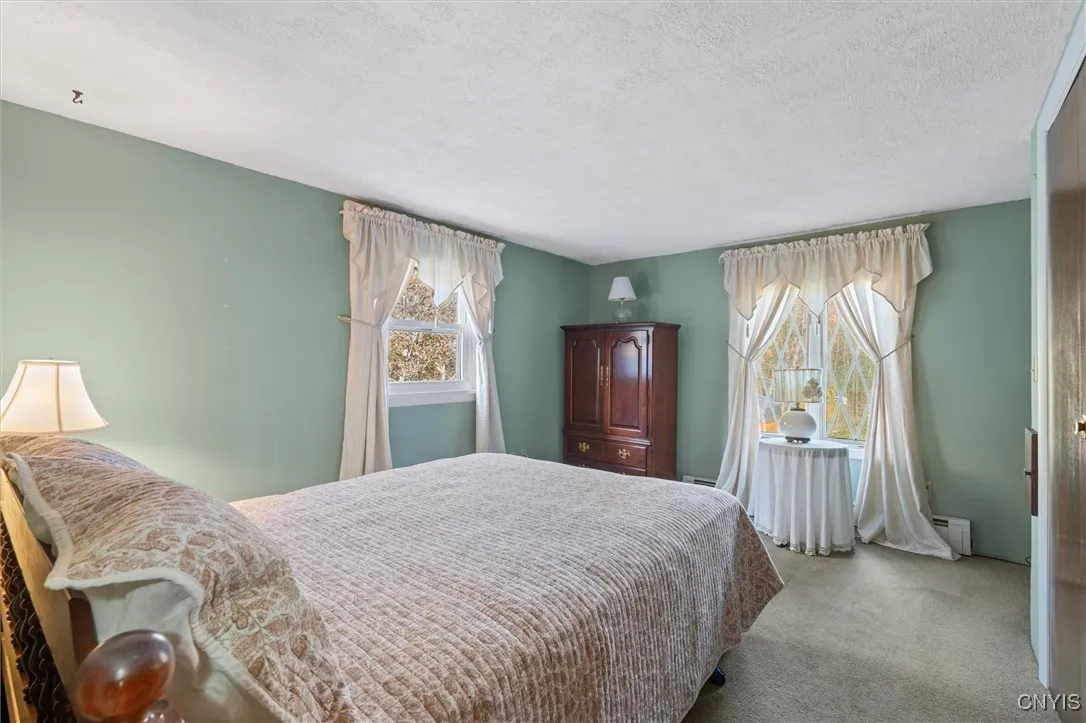 BRIGHT SECOND FLOOR BEDROOM ALLOWS SO MUCH NATURAL SUNLIGHT