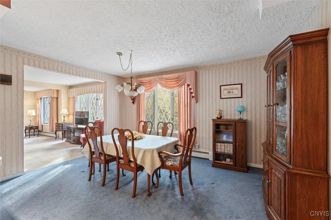 SPACIOUS LAYOUT WITH SMOOTH FLOW FROM DINING TO LIVING ROOM