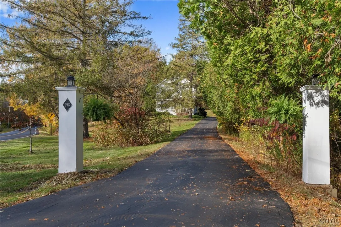 PILLER ENTRY SETS THE TONE FOR THIS LOVELY HOME