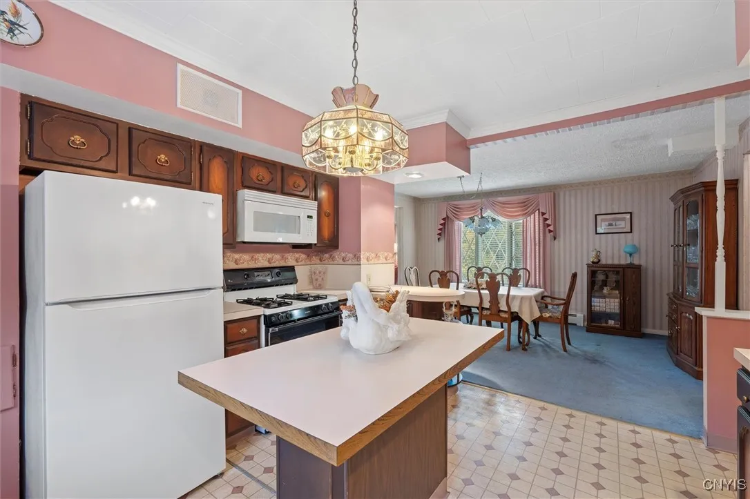 ENJOY MUSIC WHILE YOU COOK W/BUILT IN SPEAKERS IN THE KITCHEN