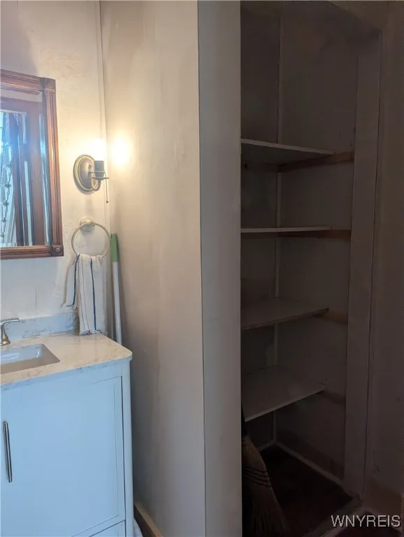 Unit 1 half bath closet