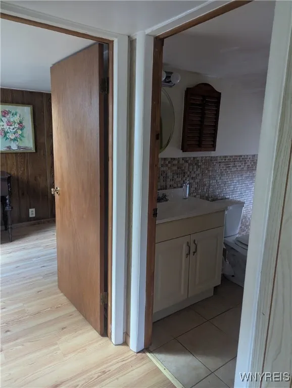 Unit 2 upstairs hall, full bath and bedroom 2.