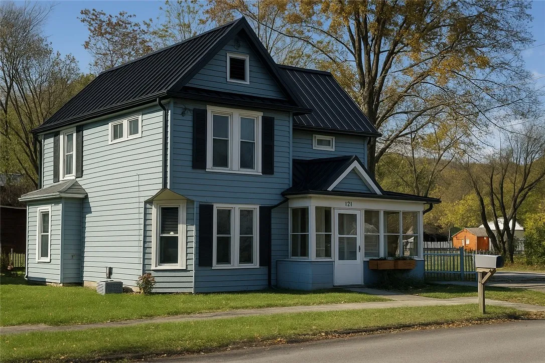 Front view with new black metal roof (virtually enhanced)