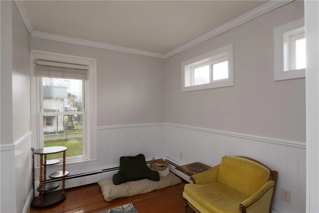 Upstairs Office or Bedroom. Bright and versatile space ideal for a home office, reading nook, or guest bedroom. Features hardwood floors, neutral tones, and plenty of natural light for a comfortable and productive atmosphere.