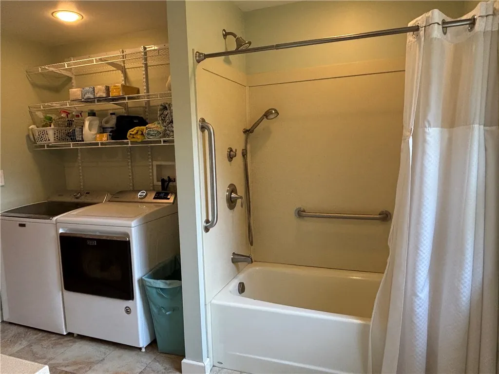 Full bath w/laundry and access to 2nd bedroom