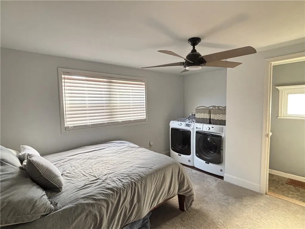 1st bedroom w/laundry and 1/2 bath