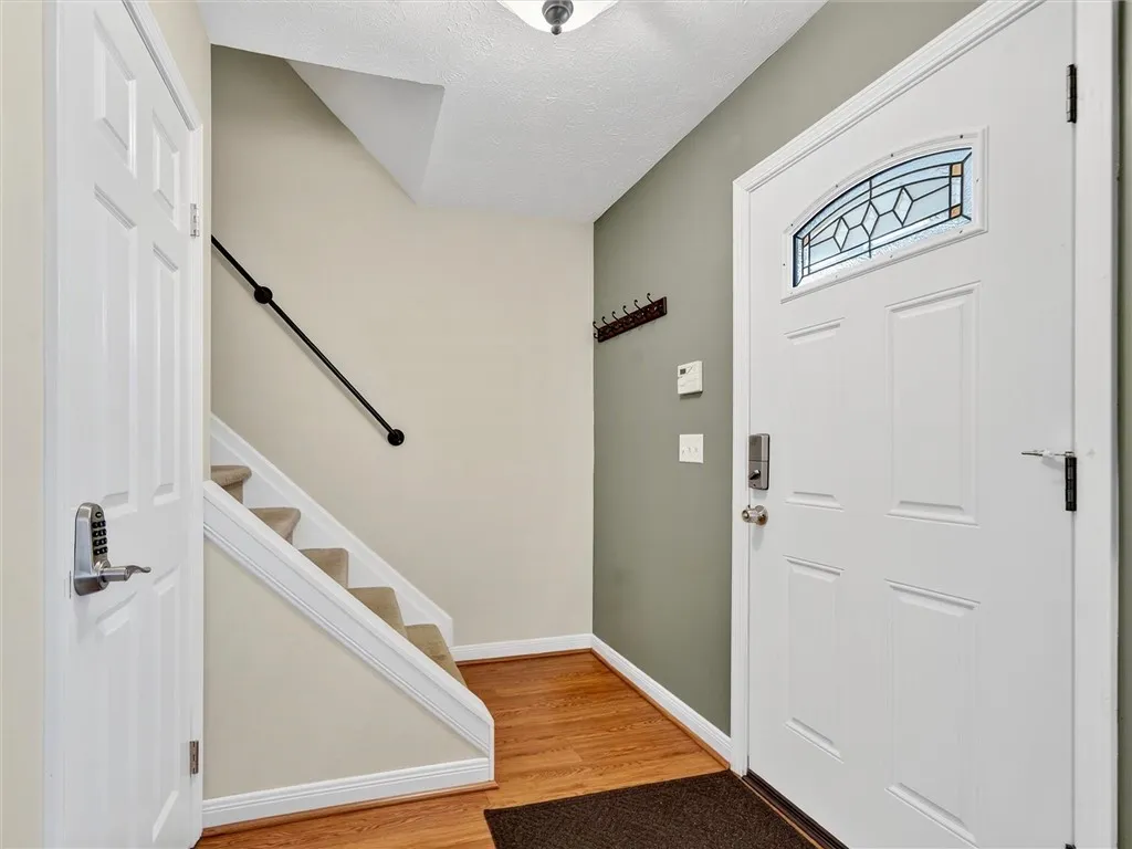 Front door and stairs to second floor