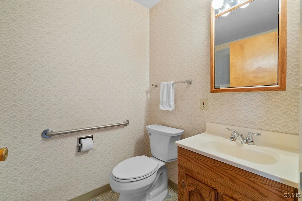 First floor half bath with washer and dryer