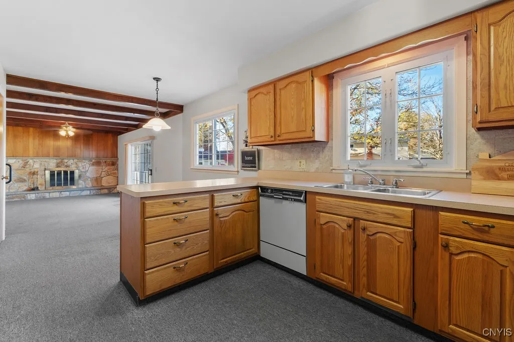 The kitchen has an eat in area and step down to the family room.
