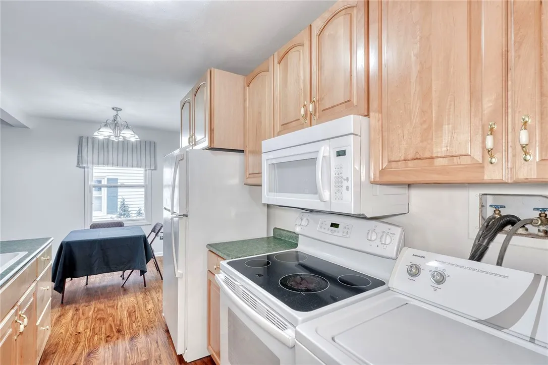 kitchen opens to family room- with first floor laundry!