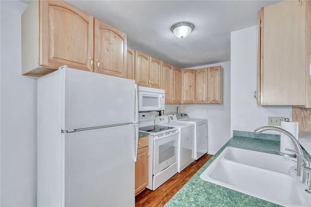 kitchen opens to family room- with first floor laundry!