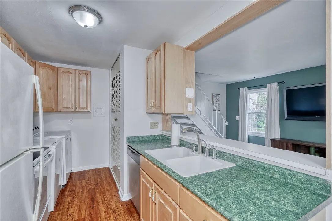 kitchen opens to family room- with first floor laundry!