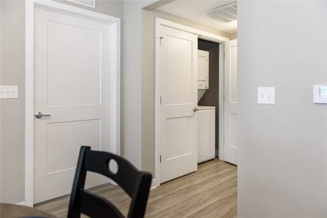 View of typical in-unit laundry near great room