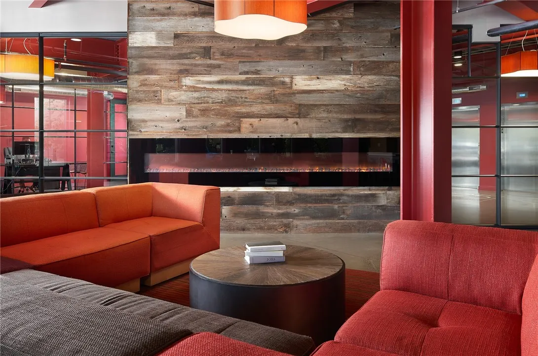 Community gathering  room with conversation area near fireplace