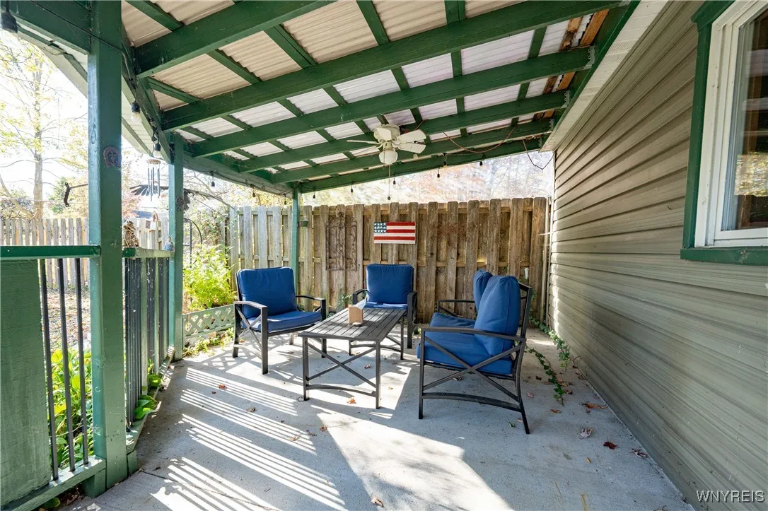 Covered, back concrete patio