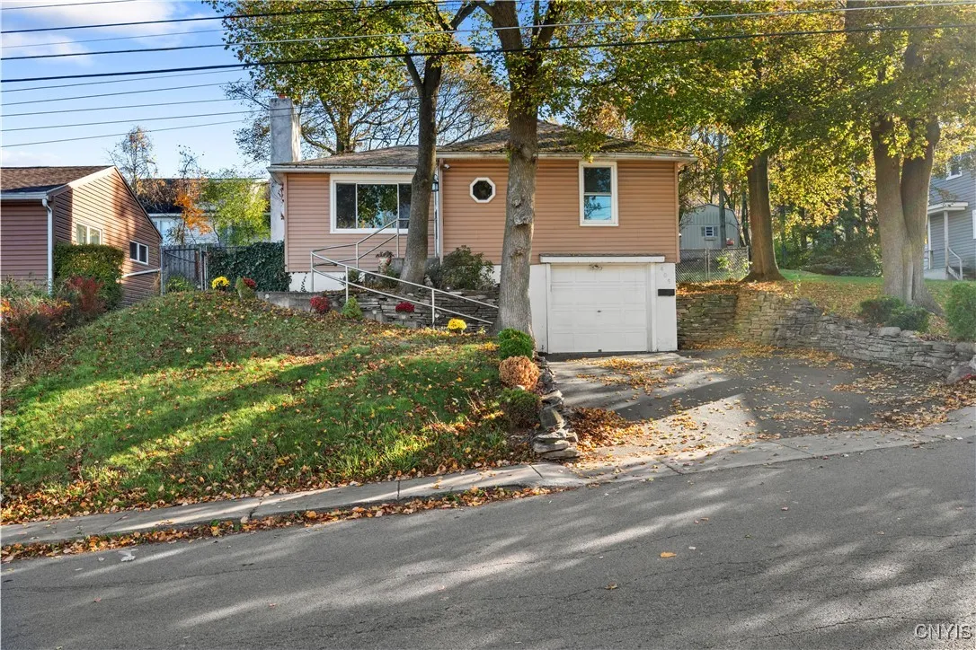 Welcome to 405 Abell Ave! Tucked along a peaceful Solvay street, this delightful ranch is full of updates. This home can be entered through the garage with automatic opener, or up the cool curved stairs to the enclosed front porch.