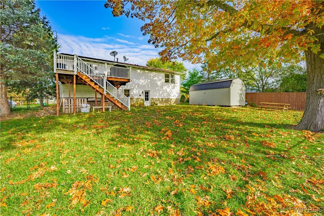 Relax or entertain on the spacious deck with views of the large, private yard.