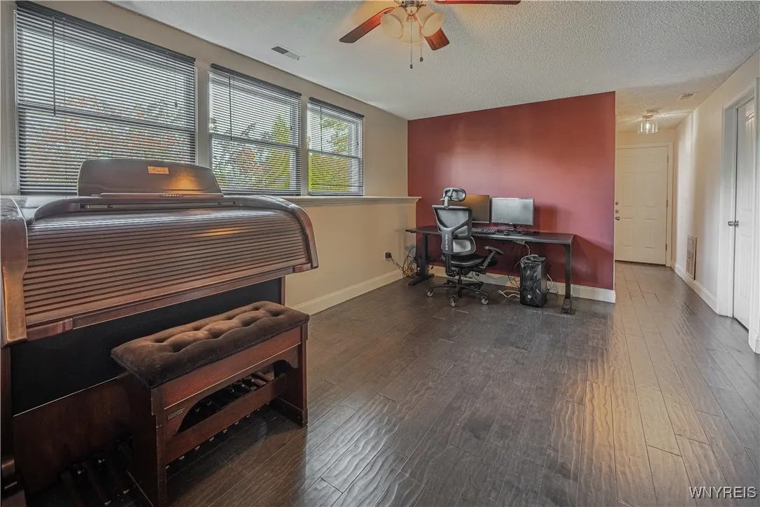 Flexible bonus space ideal for an office, home gym, hobby area, or additional living space.