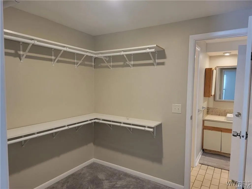 Primary Bedroom Walk in Closet