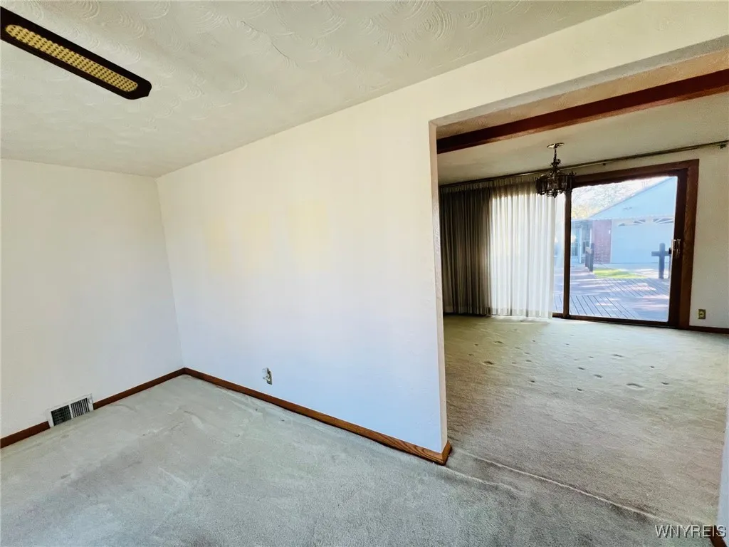 living room opens to dining room
