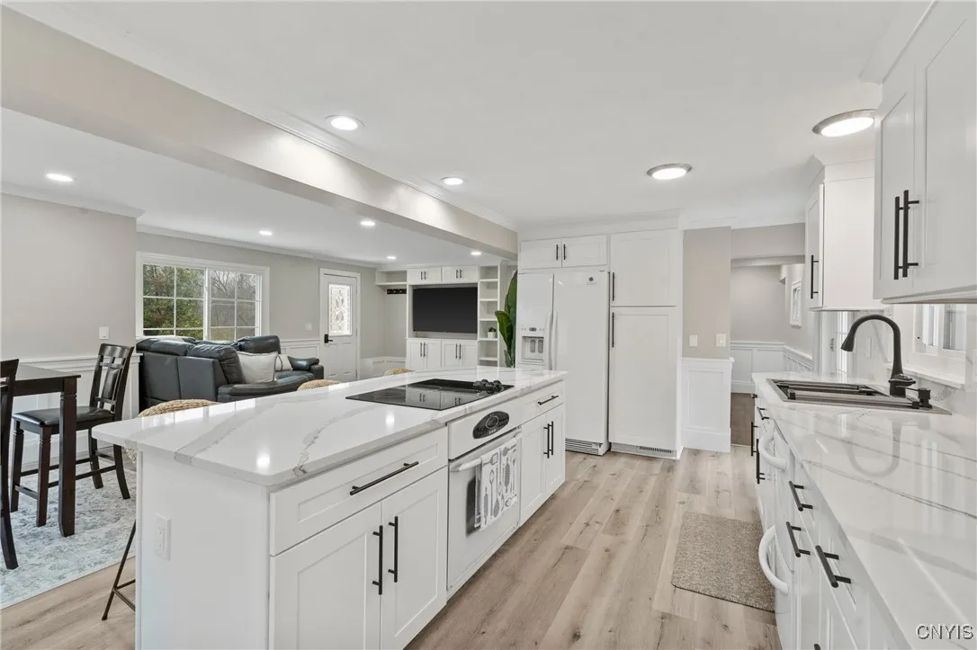 Expect to be impressed with the high end finishes and open floor plan that feels