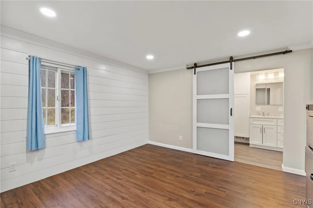 First Floor Primary Bedroom with Ensuite Bathroom and walk-in closet!